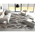 Havenside Home Ophenia Tropical Leaves Outdoor Rug