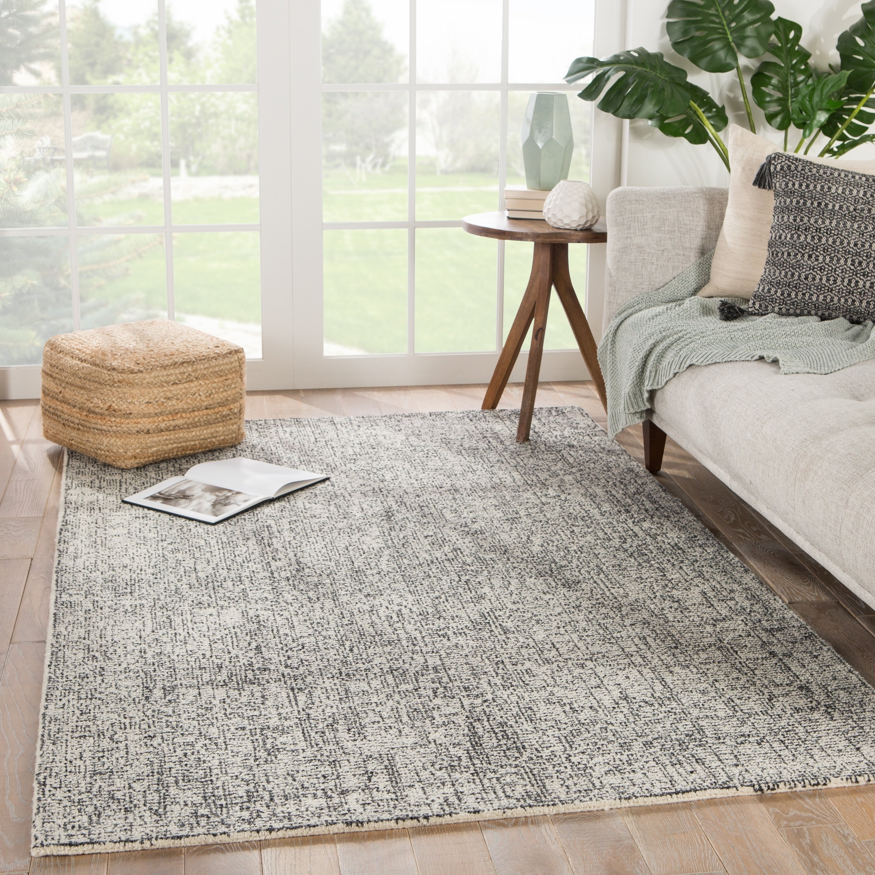 Carson Carrington Tannsele Handmade Solid Cream Black Area Rug