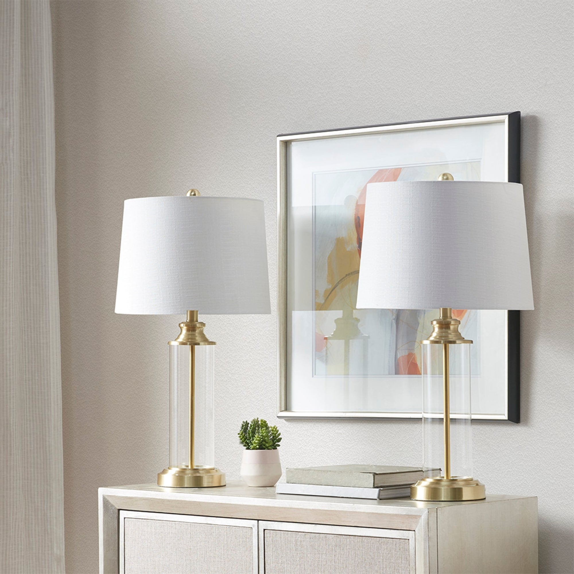 Roomfitters Gold Metal And Clear Glass Cylinder Table Lamps Set Of 2 Featuring Off White Fabric Drum Shades For Bedrooms