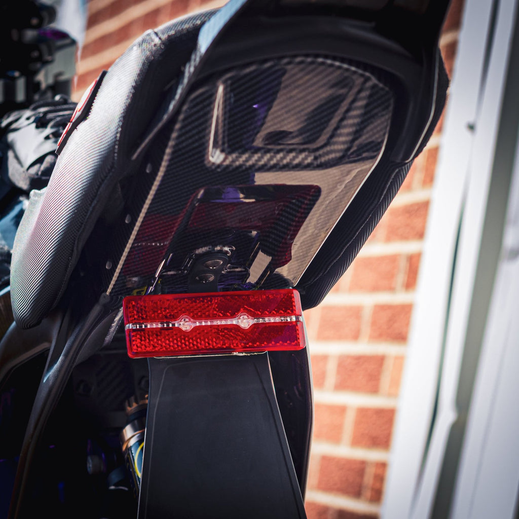 SUR RON UNDER SEAT MUDGUARD/INNER PANEL – CARBON