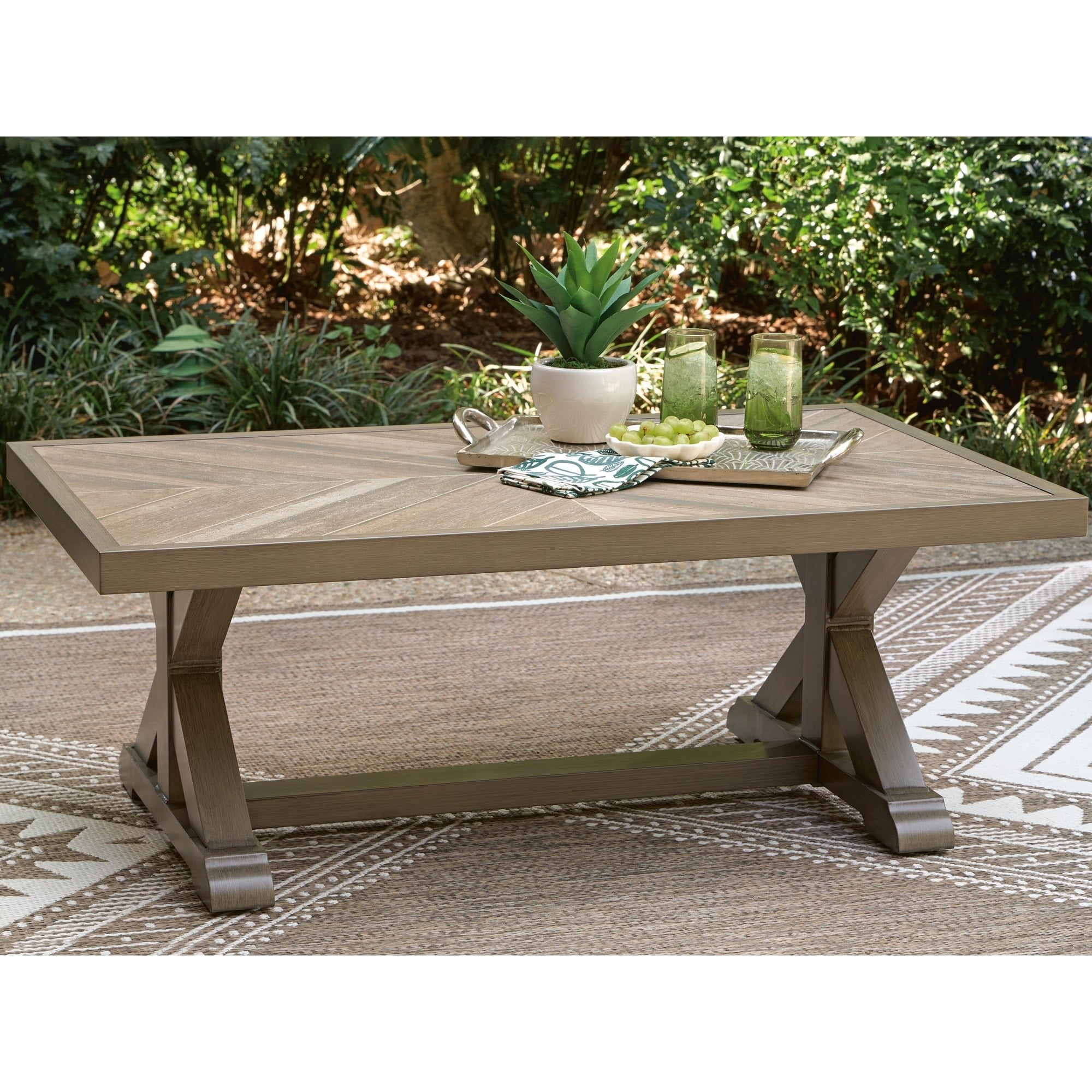 Signature Design By Ashley Carmel Bay Beige Outdoor Coffee Table 48 W X 28 D X 19 H