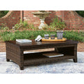 Signature Design By Ashley Drakes Beach Dark Brown Outdoor Coffee Table 48 W X 30 D X 16 H