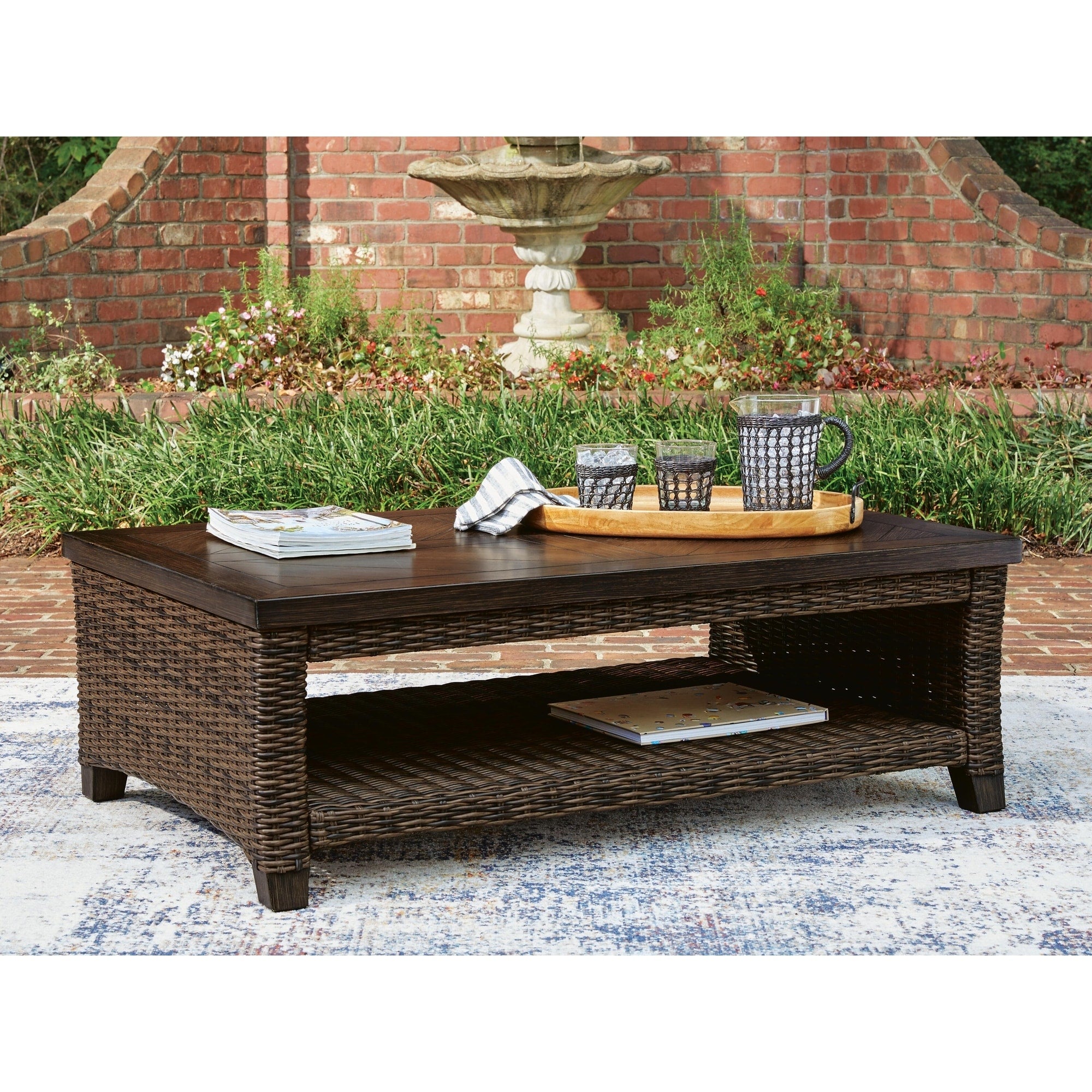 Signature Design By Ashley Drakes Beach Dark Brown Outdoor Coffee Table 48 W X 30 D X 16 H