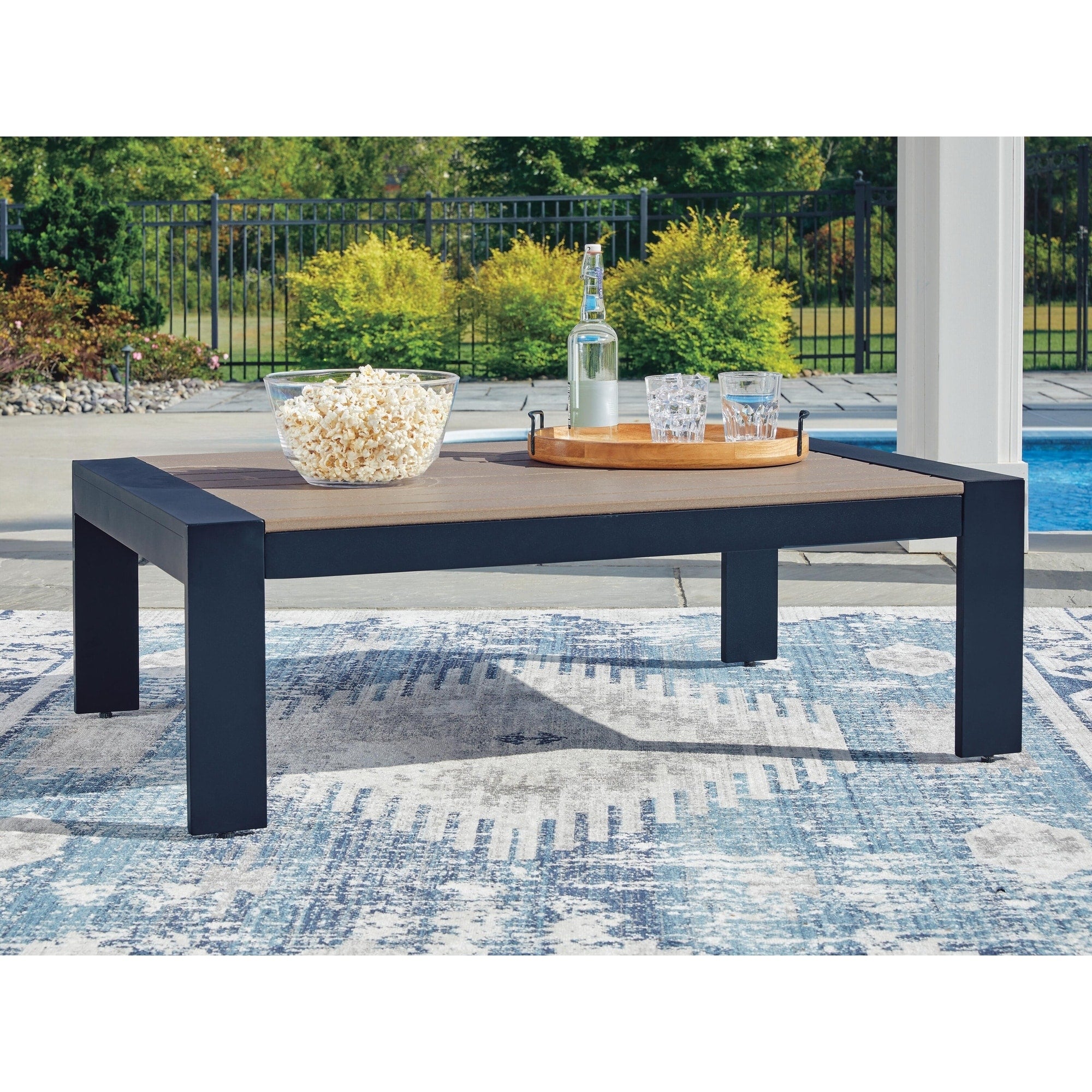 Signature Design By Ashley Mabry Shores Navy Blue Brown Outdoor Coffee Table 48 W X 32 D X 16 H