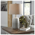 Signature Design By Ashley Marnina Off White Ceramic 24 Inch Table Lamps With Taupe Shades Set Of 2