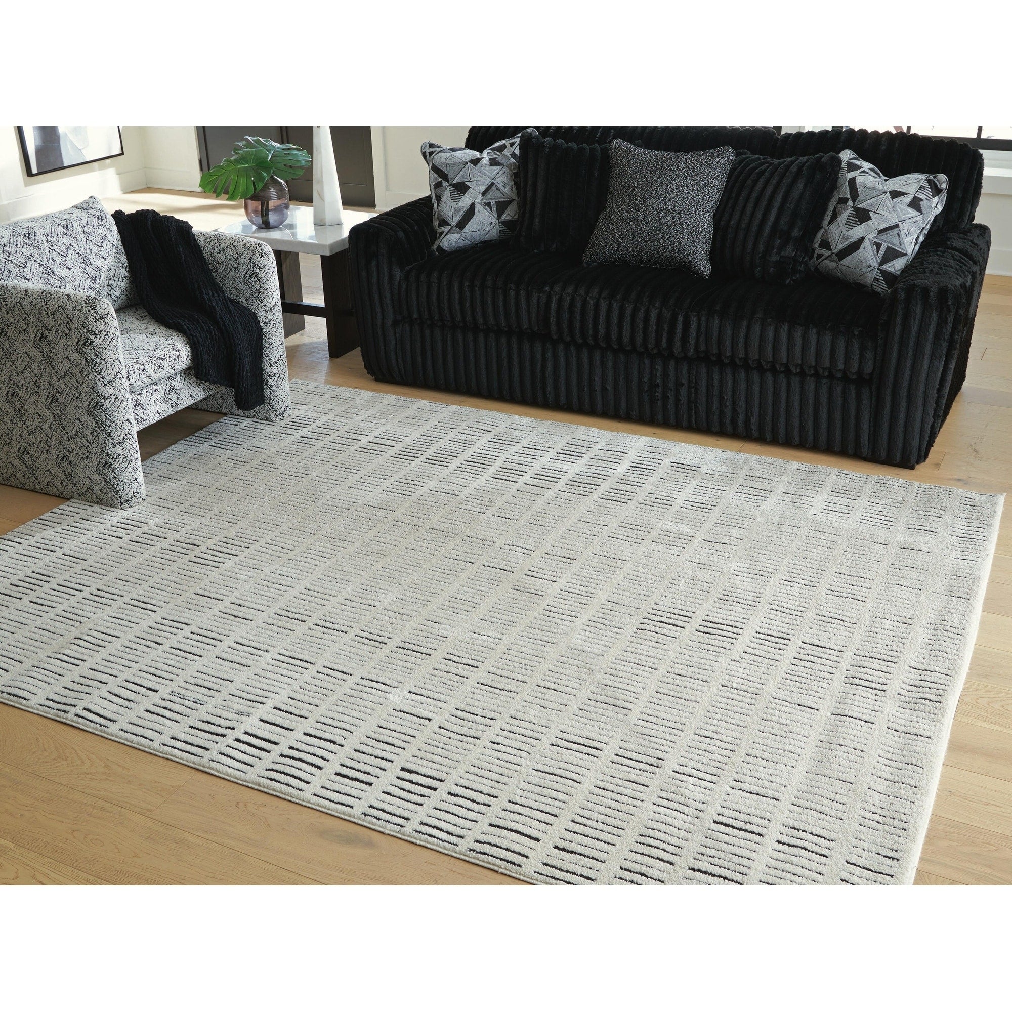 Signature Design By Ashley Turinwith Beige Black Area Rug