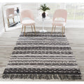 The Curated Nomad Drake Handwoven Geometric Black Indoor Outdoor Rug