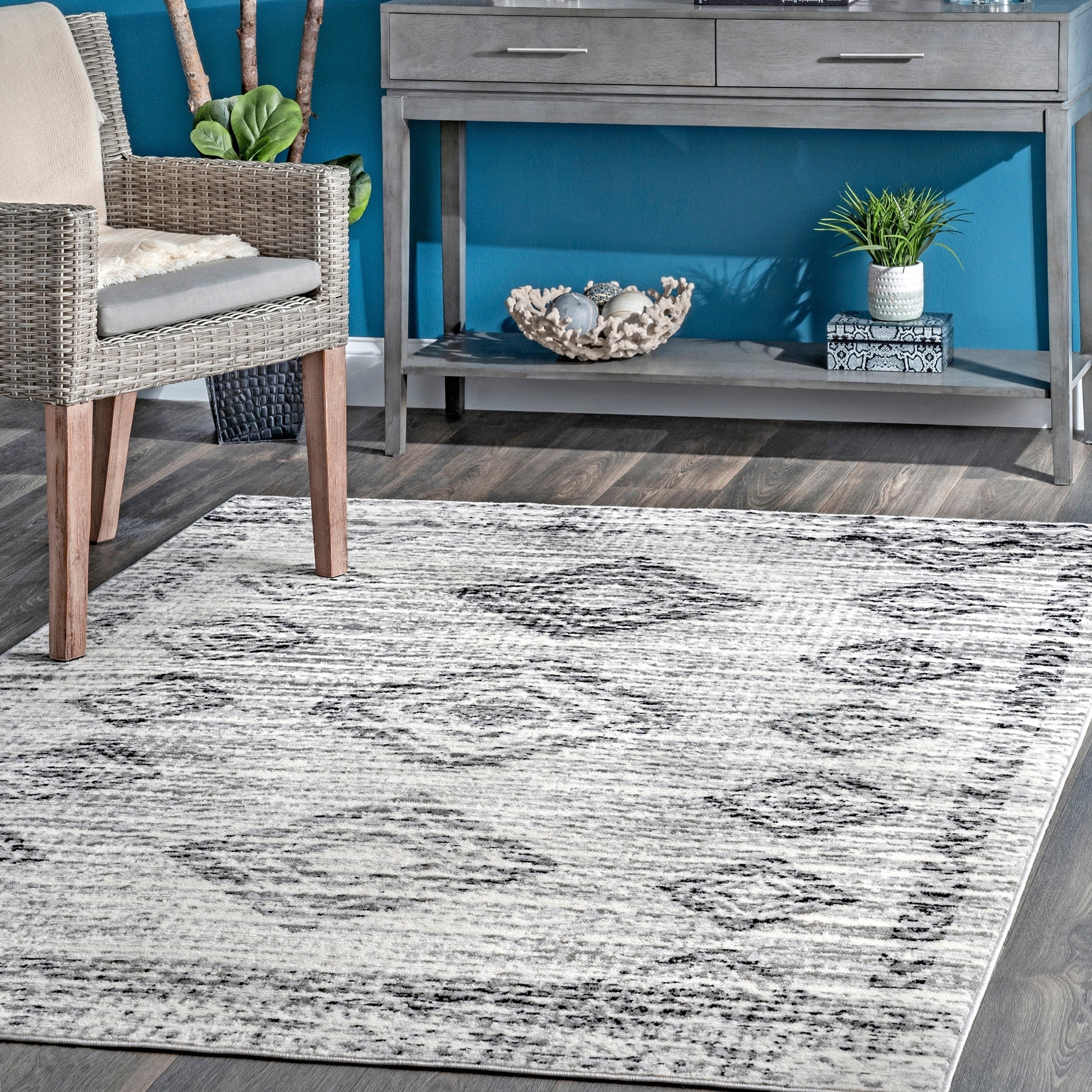 The Curated Nomad Nellie Faded Aztec Oriental Area Rug