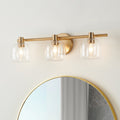 Valentina 24 Inch 3 Light Champagne Gold Vanity Light With Clear Glass Shades