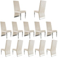 White Pu Leather Dining Chairs With Nail Head Trims And Mirrored Silver Metal Legs