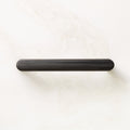 Curveaux Scored Round Black Cabinet Knob