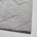 Carved Triangles Wool Nursery Rug