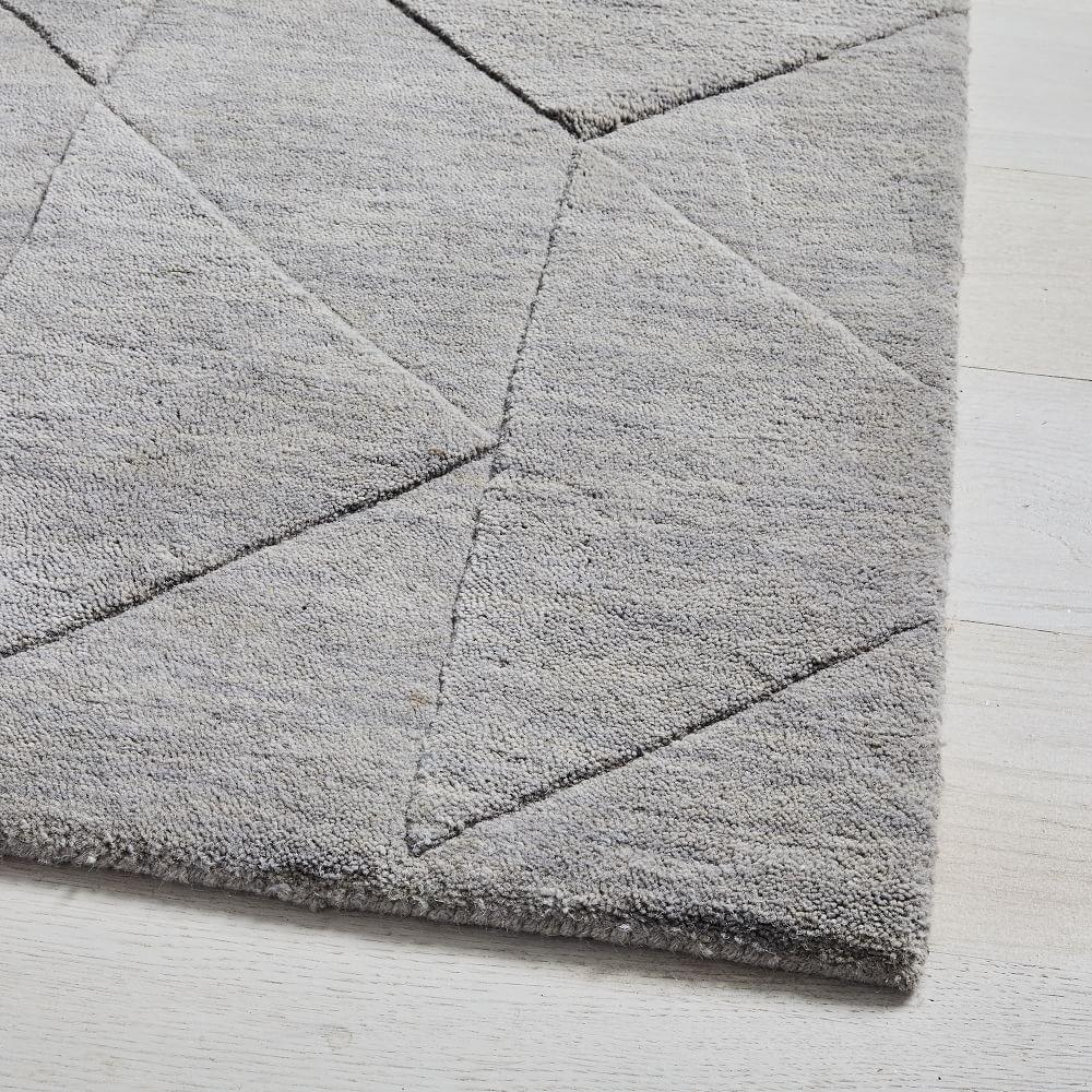 Carved Triangles Wool Nursery Rug